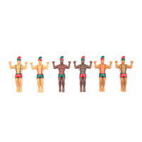 Set of six small figurines in swimsuits on a white background
