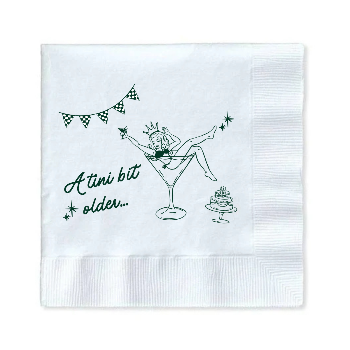 White paper cocktail napkin with a girl in a martini glass and text that reads "A Tini Bit Older" for martini themed birthday parties and celebrations is shown against a white background