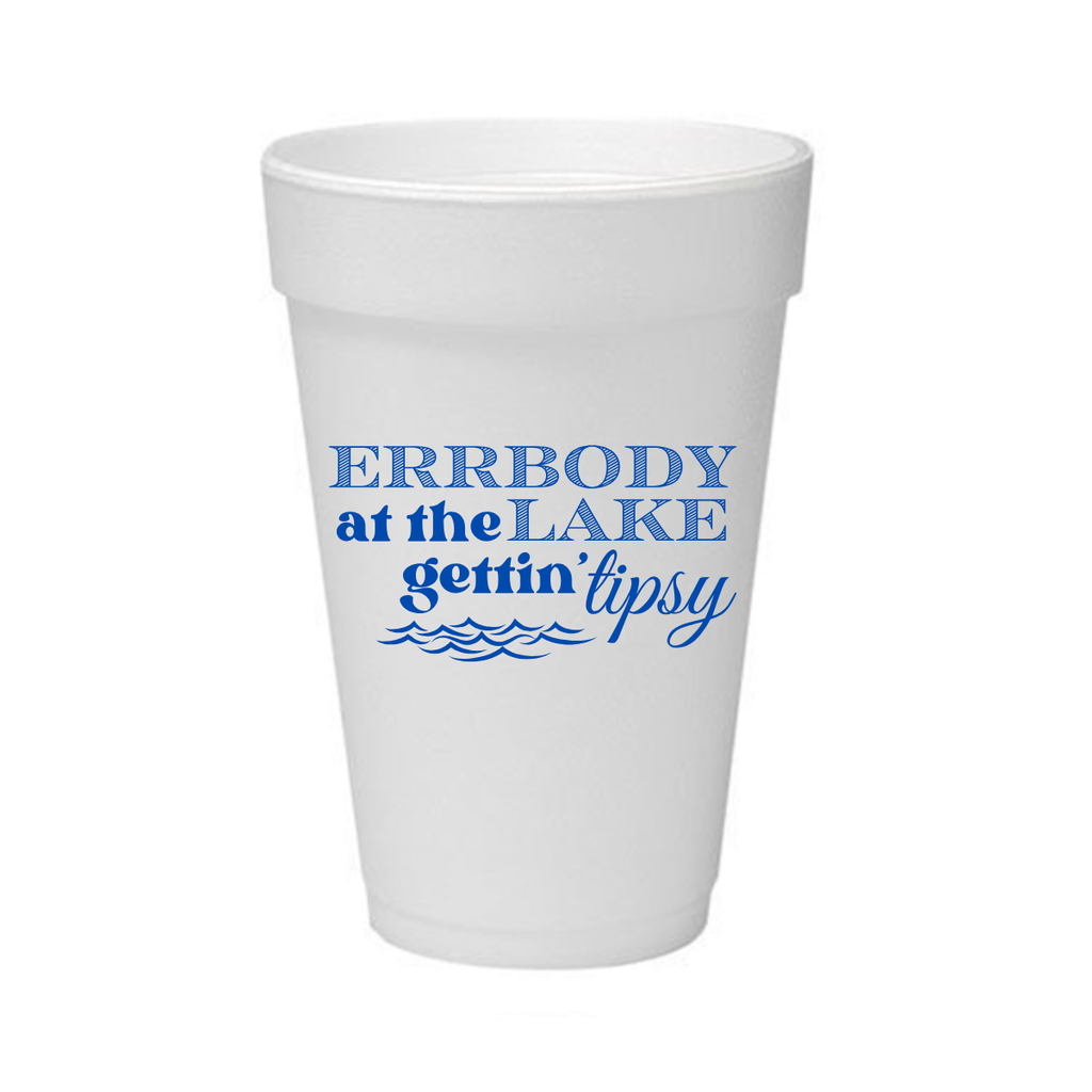 A white foam cup with blue printed text reading 'ERRBODY at the LAKE gettin' tipsy' and small wave graphics, shown on a plain white background.