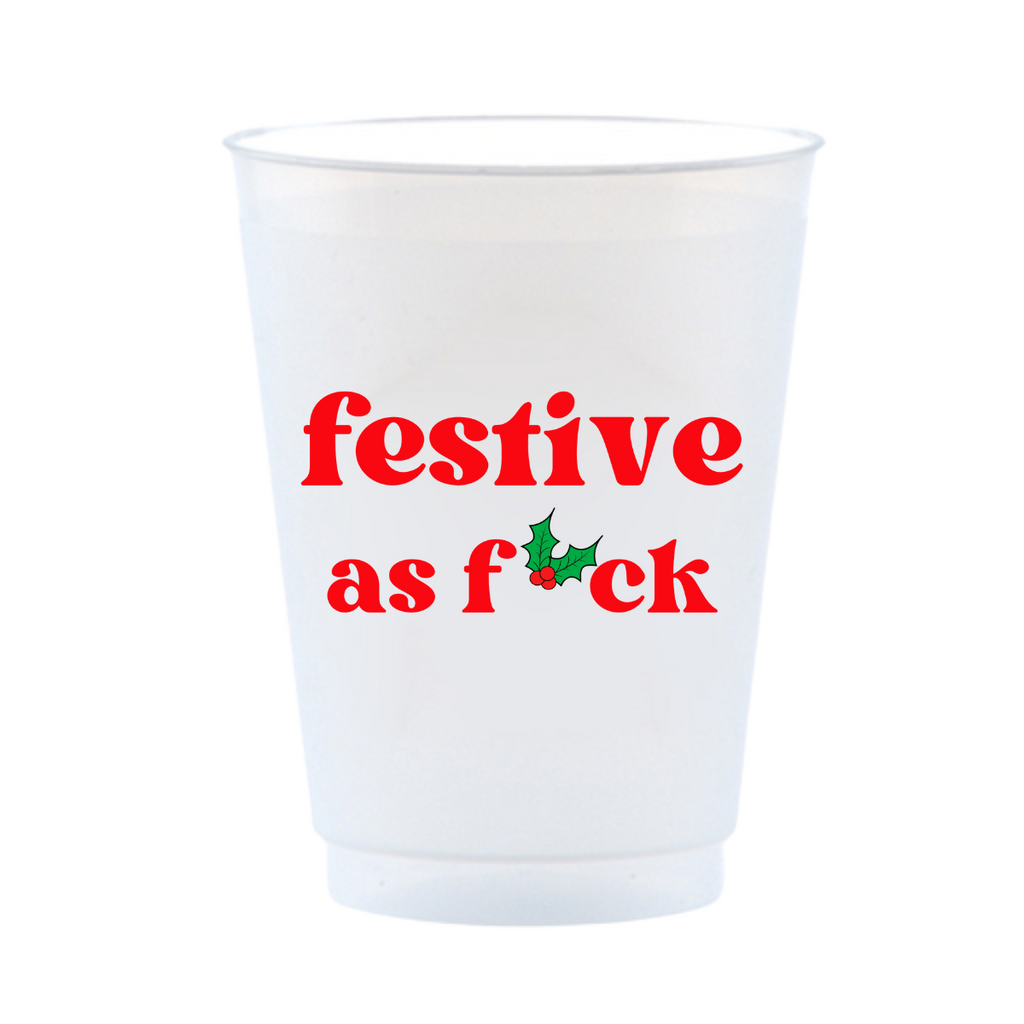 White plastic cup with red text 'festive as f*ck' and a holly leaf design on a white background