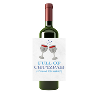 Red wine bottle featuring a fun Hanukkah wine label that shows two glasses clinking above the text "Full of Chutzpah - you've been warned." Perfect for Jewish holidays and fun parties. 