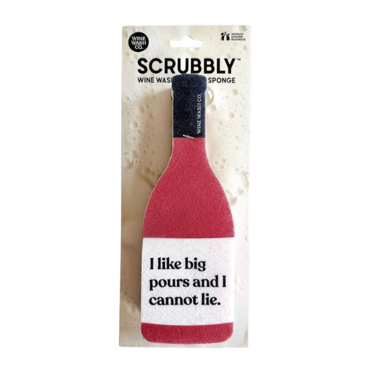 A wine bottle-shaped Scrubbly wine sponge in red and white with a black neck, packaged on a white backing card that reads 'SCRUBBLY WINE WASH SPONGE' and 'I like big pours and I cannot lie.'.