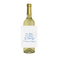Wine bottle featuring a Sunshine Daisy 'New Baby, New Home, New Beginning" wine label. Perfect for closing gifts, new home gifts, and housewarmings.