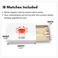 Matchbox with 'OH CRAB!' design and matchsticks, dimensions labeled.