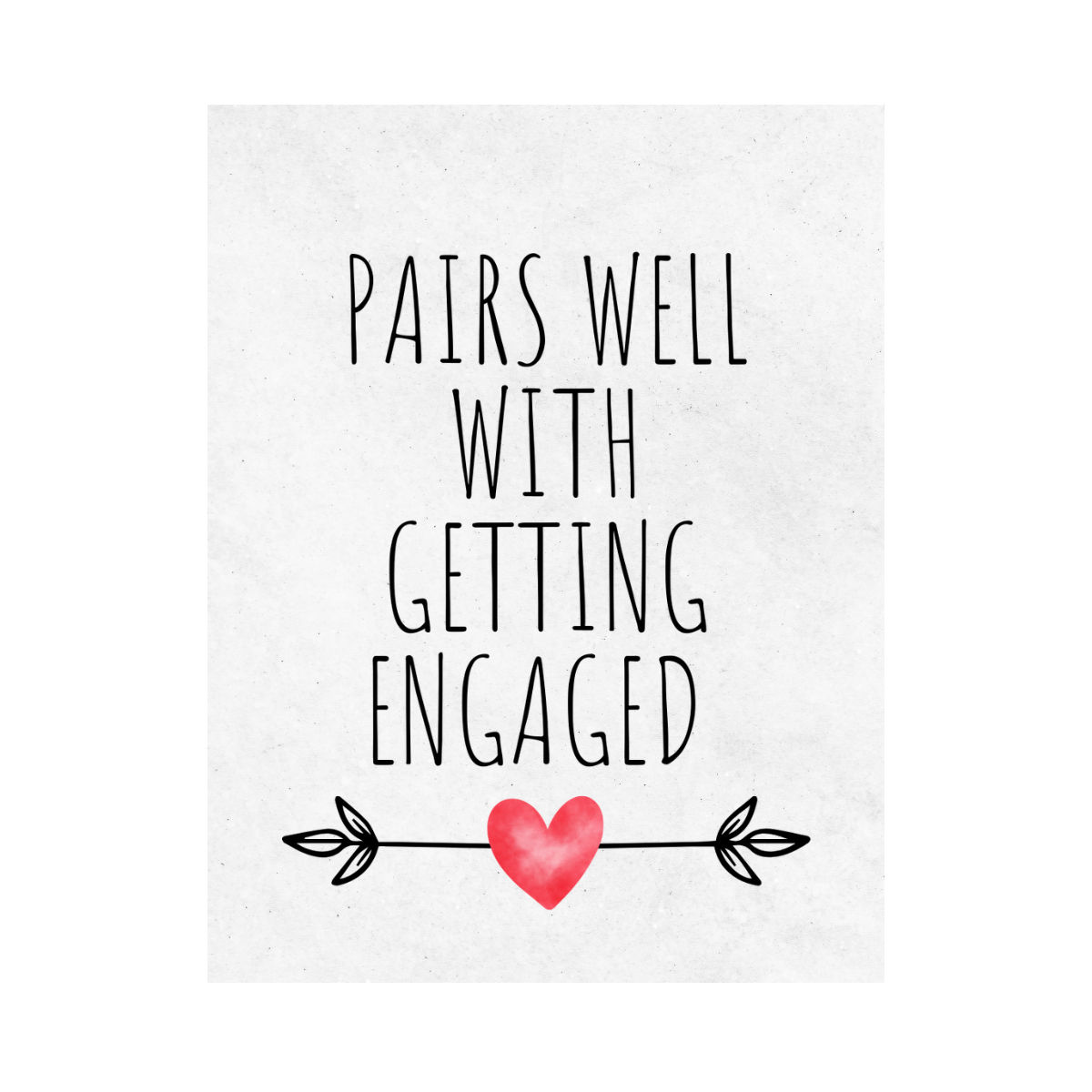 Wine label with  text 'PAIRS WELL WITH GETTING ENGAGED' and a heart and arrow design is shown against a white background. 