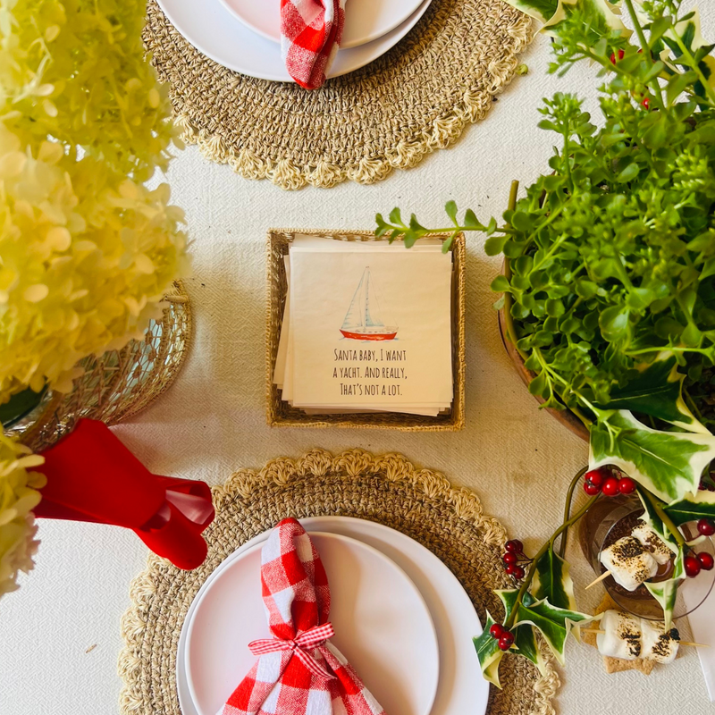 Santa Baby Napkin in napkin holder on holiday table