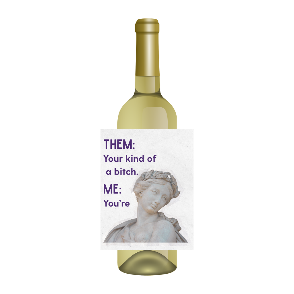 White wine bottle with a wine label that reads "Them: Your kind of a bitch. Me: You're." Shown against a white background.