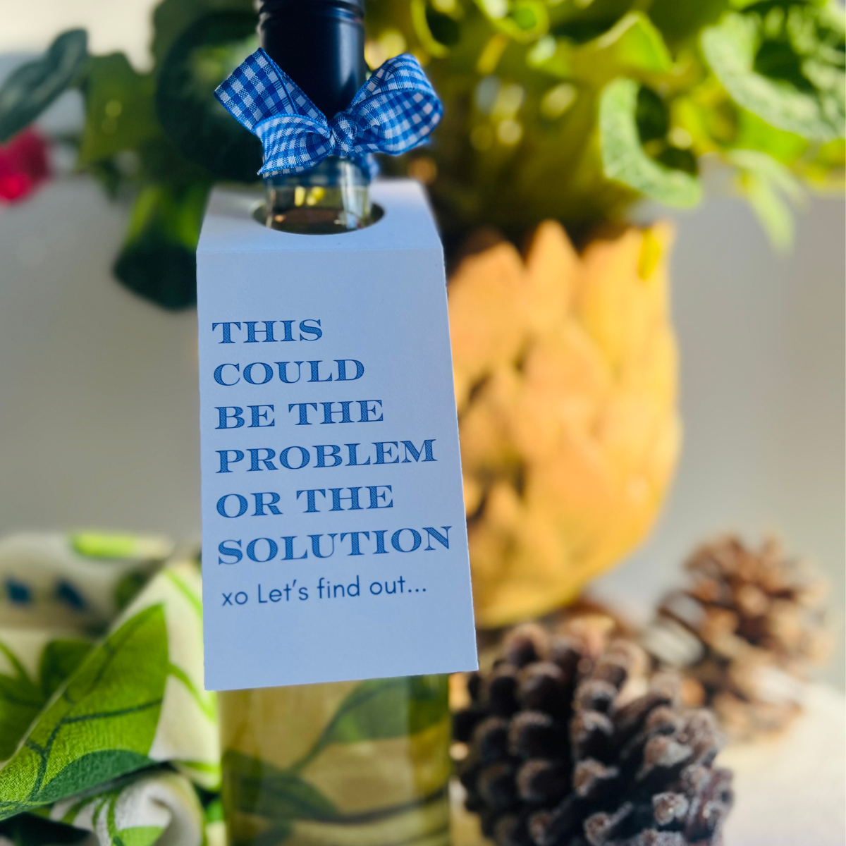 Wine bottle is shown with a fun wine tag.