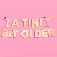 Tini Bit Older Banner - gold foil banner