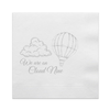 White paper cocktail napkin with a silver foil stamped design featuring script that reads "We Are On Cloud Nine." The script appear below a fluffy cloud and a floating hot air balloon. A perfect napkin for a gender reveal party or a "On Cloud Nine" baby shower. 
