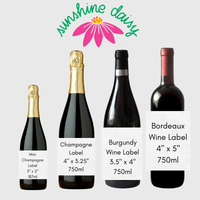 Wine bottles with various sized labels demonstrate the difference in the wine label sizes on offer. 4 Available sizes and their dimensions are shown - including dimensions of labels for mini champagne wine labels, champagne wine labels, burgundy (or small) wine label, and bordeaux (or large) wine label.  The "sunshine daisy' logo appears at the top of the image on a light gray background