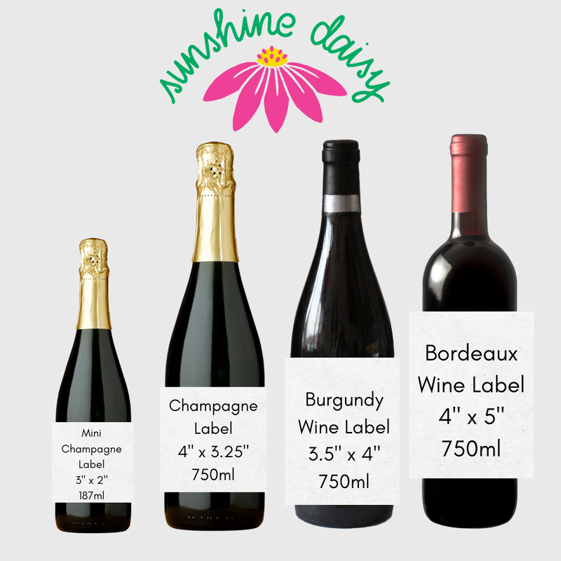 Wine bottles with various sized labels demonstrate the difference in the wine label sizes on offer. 4 Available sizes and their dimensions are shown - including dimensions of labels for mini champagne wine labels, champagne wine labels, burgundy (or small) wine label, and bordeaux (or large) wine label.  The "sunshine daisy' logo appears at the top of the image on a light gray background