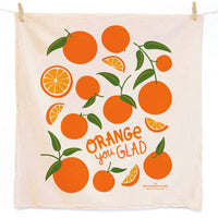 Screen printed cotton tea towel with orange design and 'Orange you Glad' text on a white background