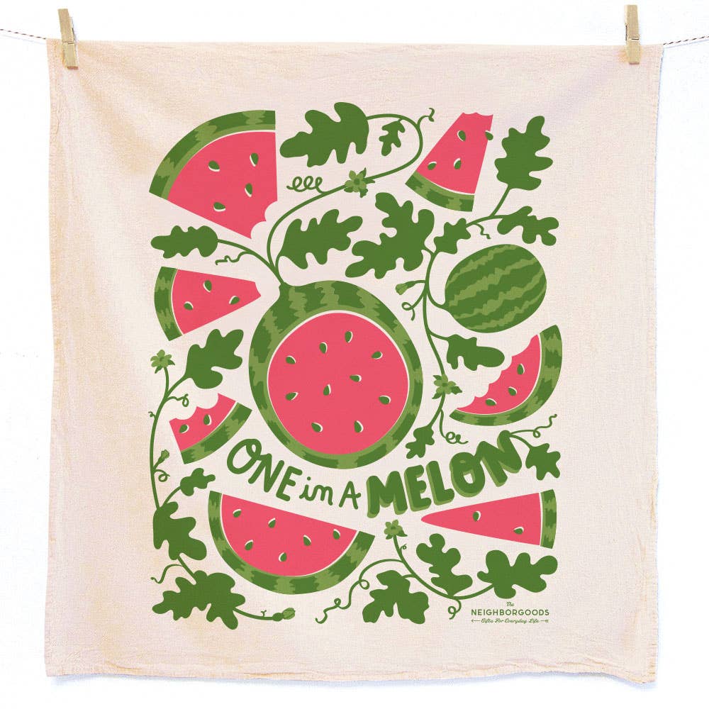 Decorative kitchen towel with watermelon design and text 'One um a Melon' on a white background.